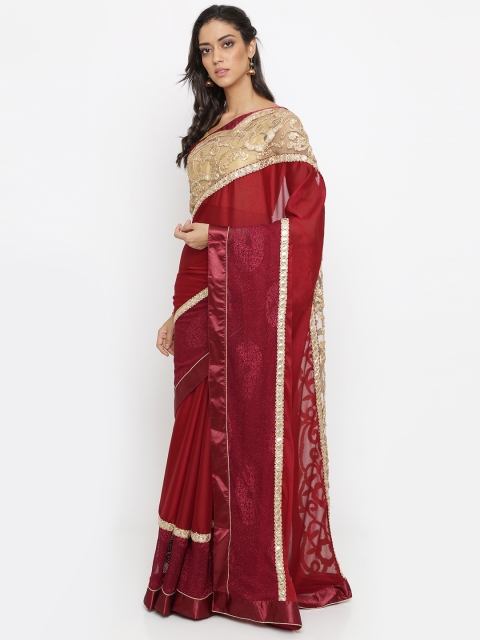 

Indian Women Maroon Embellished Poly Chiffon Saree