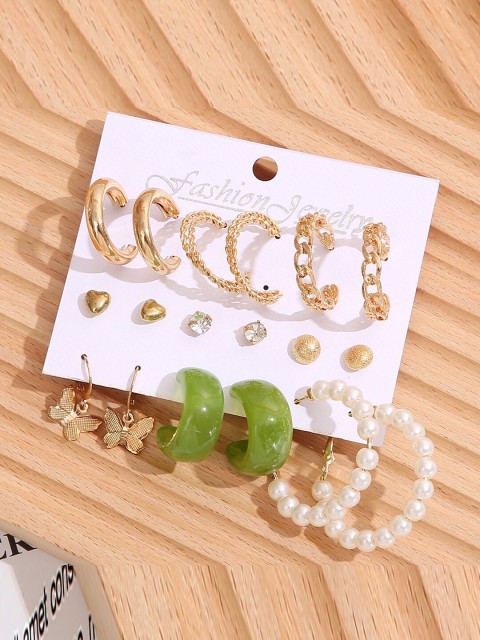 

Shining Diva Fashion Pack of 9 Gold Plated & White Contemporary Studs Earrings