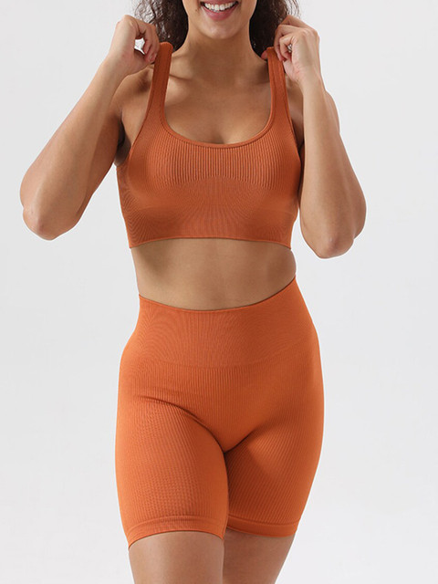 

URBANIC Women Orange Solid Gym Track Suit