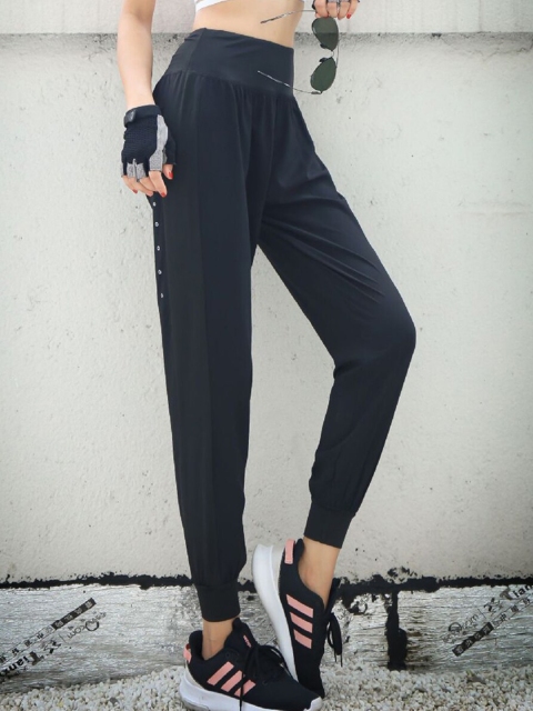 

URBANIC Women Black Solid Track Pants