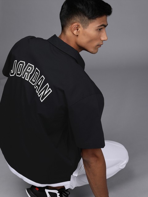 

Nike Men Black & White Embroidered M J Sports Casual Shirt