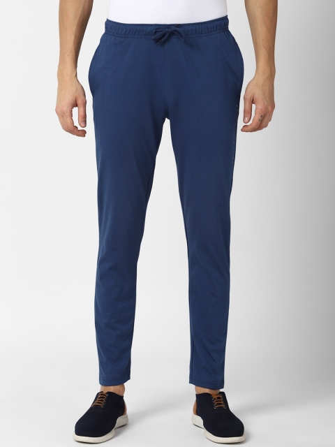 

Peter England Men Blue Solid Cotton Track Pants