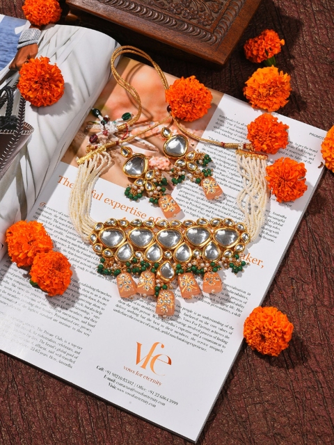 

SOHI Gold-Plated Peach-Coloured White Kundan Studded Jewellery Set