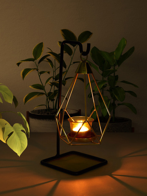 

Living scapes by Pantaloons Gold-Toned & Black Solid Candle Holder