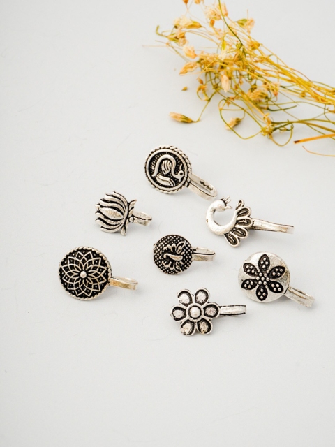 

Urmika Set of 7 Silver-Toned Nose Rings