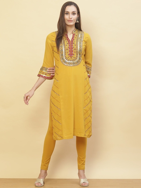 

Lakshita Women Yellow Ethnic Motifs Embroidered Flared Sleeves Thread Work Georgette Kurta