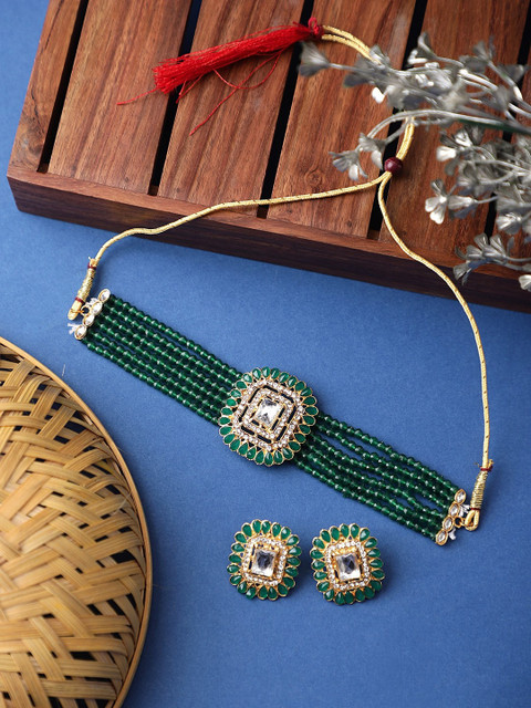 

CARDINAL Gold-Toned Green Kundan-Studded & Beaded Jewellery Set