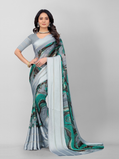 

APNISHA Teal & Silver-Toned Pure Georgette Saree