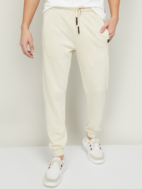 

Fame Forever by Lifestyle Men Beige Solid Cotton Track Pants