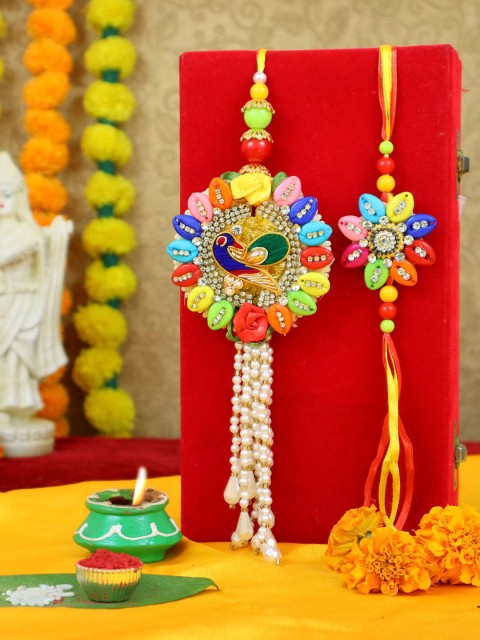 

TIED RIBBONS 2 Pieces Bhaiya Bhabhi Peacock Lumba Rakhi with Card & Roli Chawal Combo, Multi
