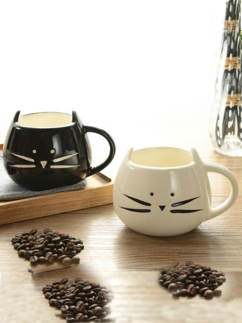

BonZeaL Black & White Hand Painted Solid Ceramic Glossy Cups Set of Cups and Mugs