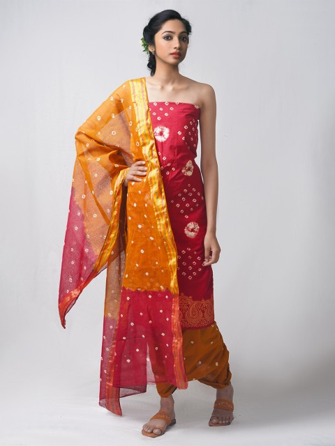 

Unnati Silks Maroon & Brown Dyed Pure Cotton Unstitched Dress Material