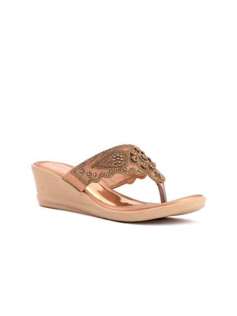 

Khadims Rose Gold Ethnic Wedge Sandals