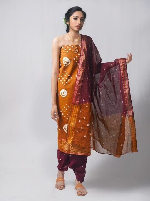 

Unnati Silks Purple & Brown Dyed Pure Cotton Unstitched Dress Material