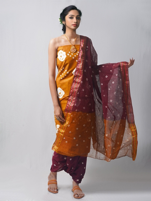 

Unnati Silks Purple & Brown Dyed Pure Cotton Unstitched Dress Material
