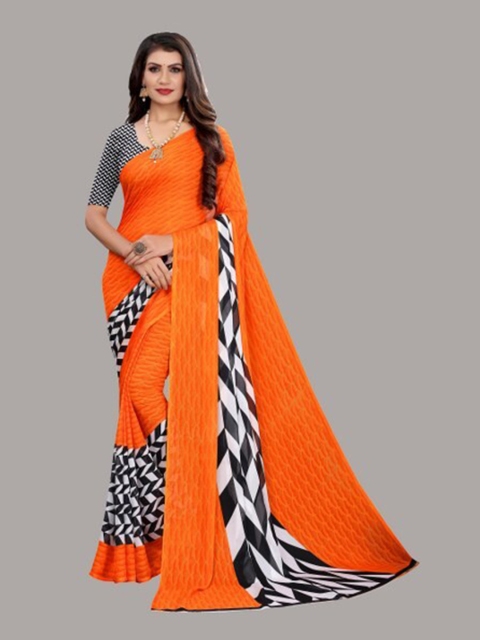 

Yashika Orange & White Saree