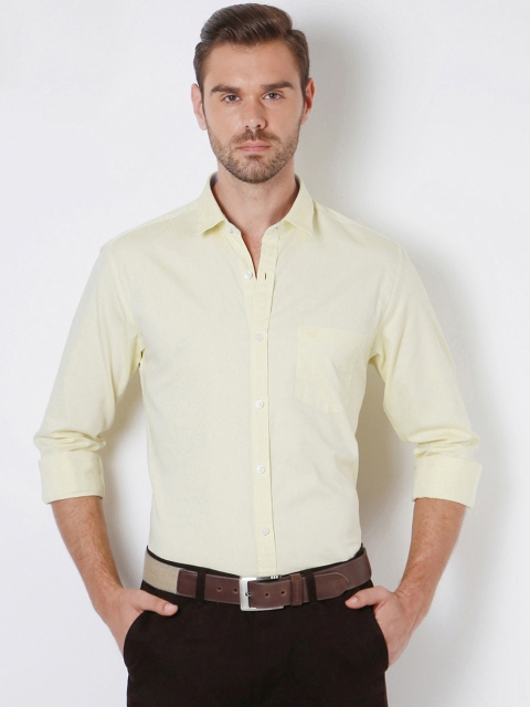 

Peter England Men Yellow Slim Solid Smart Casual Shirt