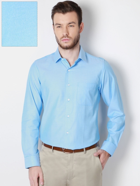 

Peter England Men Blue Slim Fit Solid Formal Shirt