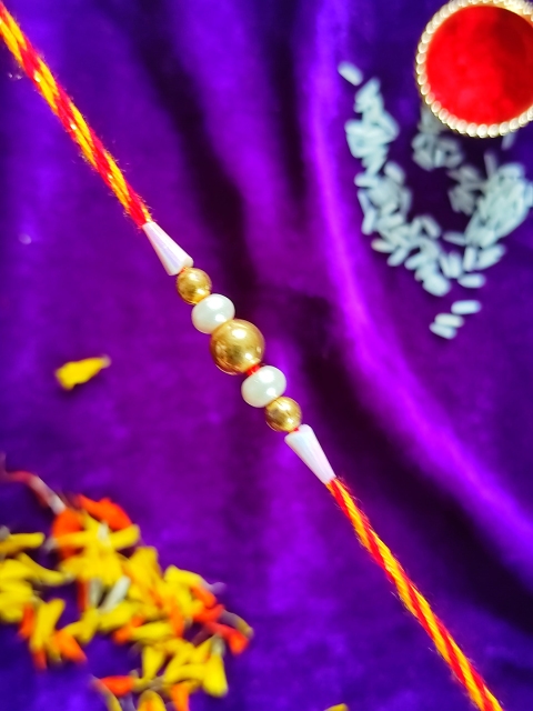 

CRAYTON Men Gold-Toned White Beaded Rakhi