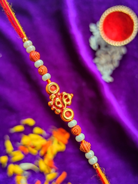 

CRAYTON Men Red & Orange Beaded Ganesha Rakhi