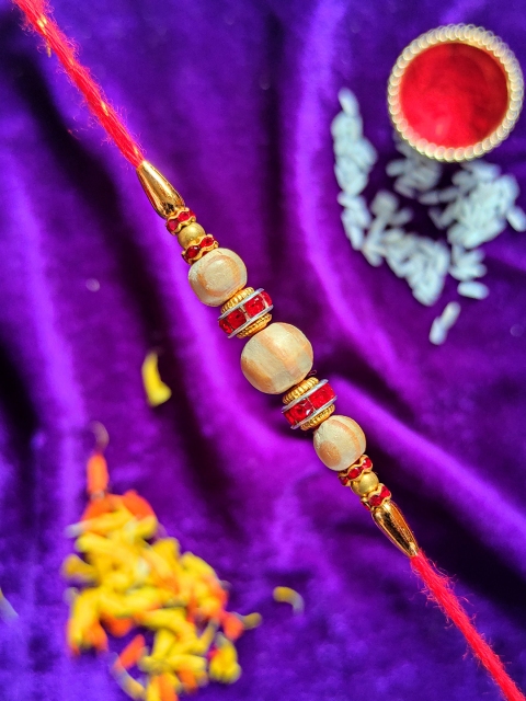 

CRAYTON Beige & Red Beaded Rakhi, Multi