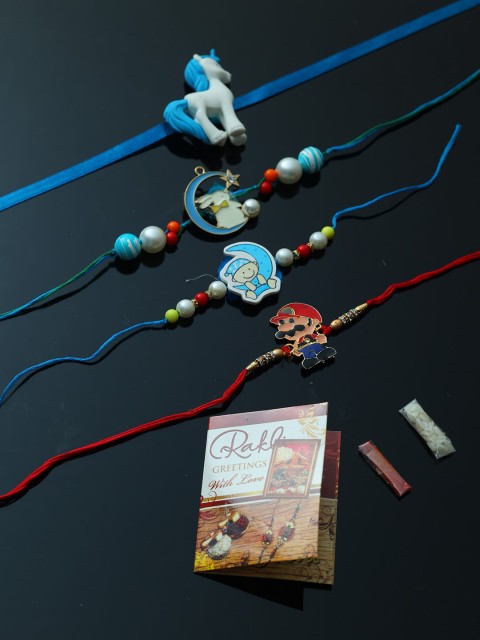 

PASSION PETALS Blue Rakhi Set
