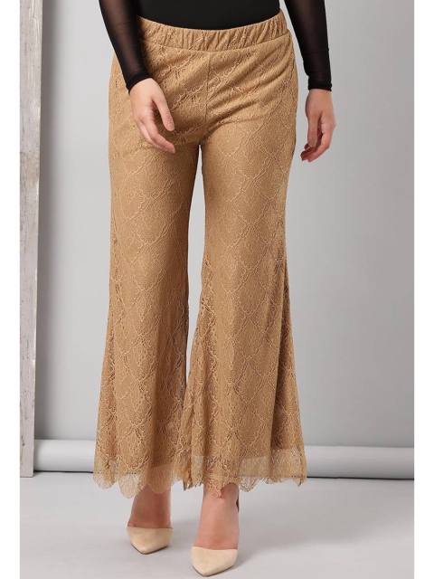 

Lakshita Women Beige Floral Embroidered Flared Palazzos