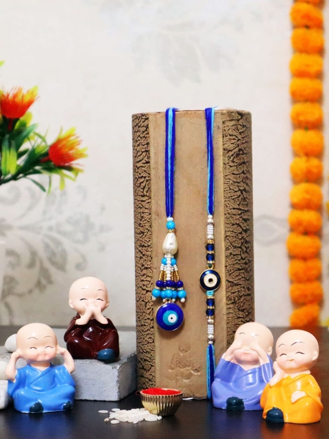 

TIED RIBBONS Multicolored Bhaiya Bhabhi Lumba Rakhi with 4 Buddha Monk Idol, Multi