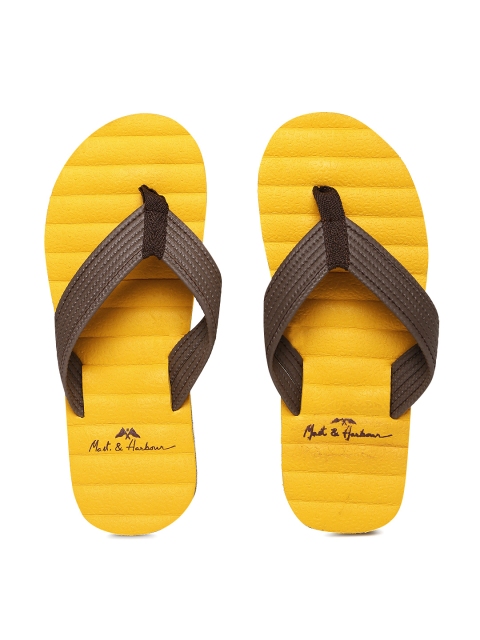 

Mast & Harbour Men Brown & Yellow Solid Thong Flip-Flops