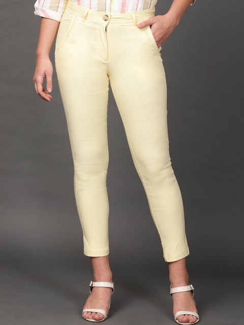 

Lakshita Women Yellow Solid Cotton Comfort Skinny Fit Trousers