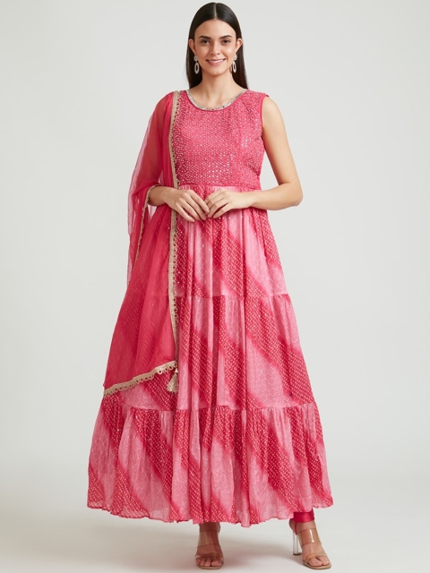 

Neerus Women Magenta Ethnic Motifs Embroidered Empire Thread Work Kurti with Churidar & With Dupatta