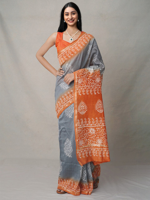 

Unnati Silks Grey & Orange Ethnic Motifs Zari Silk Blend Baluchari Saree
