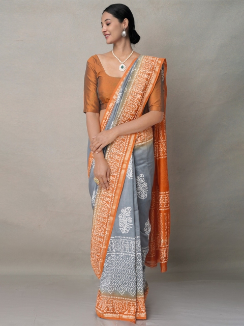 

Unnati Silks Grey & Orange Ethnic Motifs Silk Blend Baluchari Saree