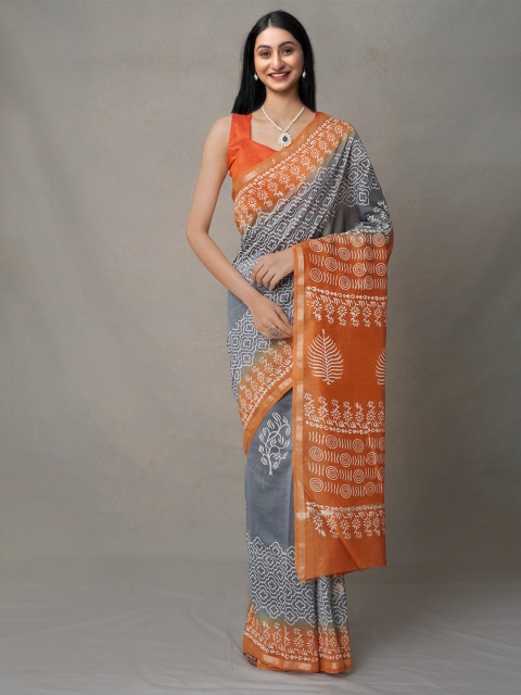 

Unnati Silks Grey & Orange Ethnic Motifs Baluchari Saree