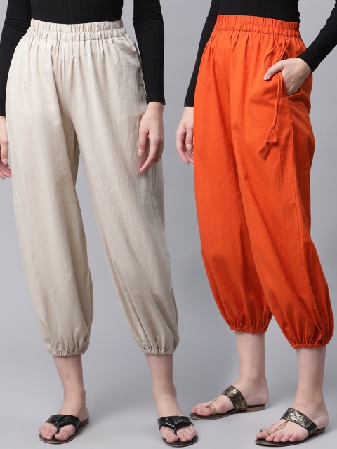 

Molcha Women Pack of 2 Rust & Beige Solid Loose Fit Afghani Cotton Salwar