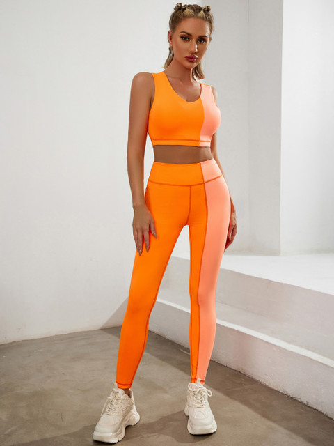 

URBANIC Women Orange & Peach-coloured Colourblocked Gym Tracksuit