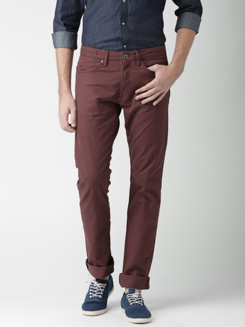 

Celio Men Burgundy Solid Regular Trousers