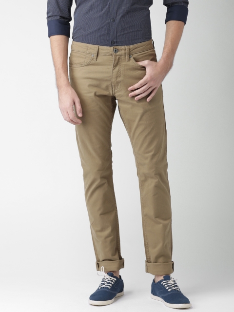 

Celio Men Khaki Solid Regular Trousers