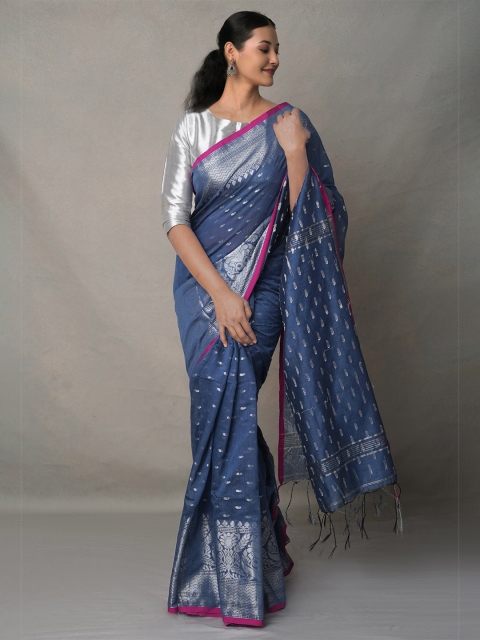 

Unnati Silks Blue & Silver-Toned Ethnic Motifs Zari Silk Cotton Handloom Jamdani Saree