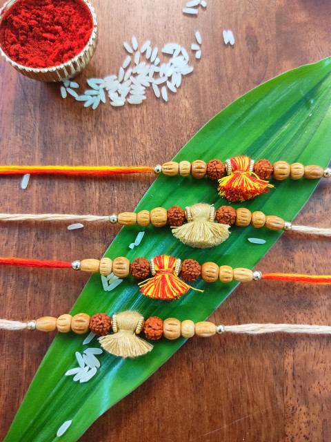 

CRAYTON Set of 4 Rakhis with Roli Chawal, Multi