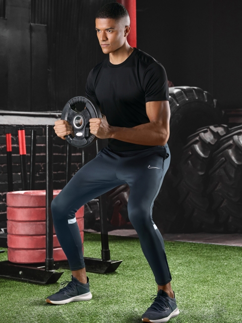 

Nike Men Blue Solid Dri-FIT Academy Soccer Track Pants