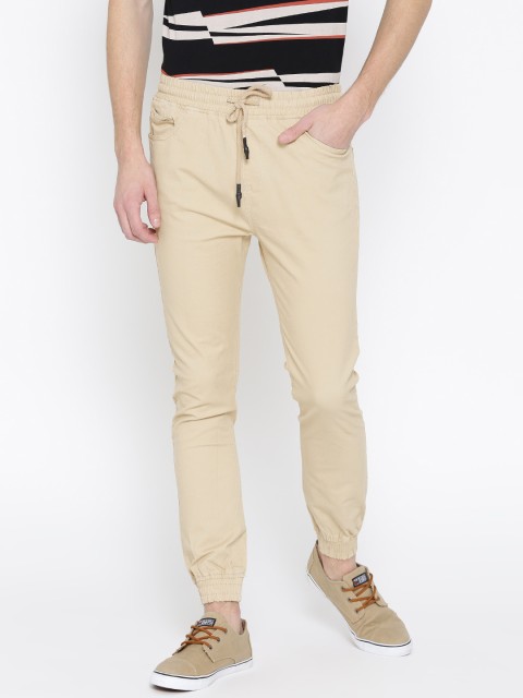 

Nature Casuals Men Cream-Coloured Solid Jogger Trousers