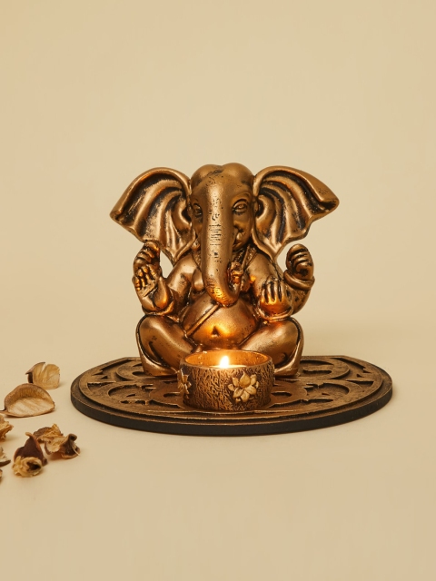 

Home Centre Gold-Toned Renaissance Textured Ganesha Showpiece T-light Holder
