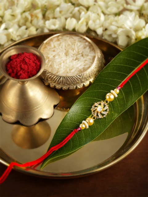

Anouk Unisex White AD Studded Thread Rakhi With Roli Chawal