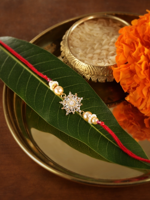 

Anouk Unisex White AD Studded Thread Rakhi With Roli Chawal