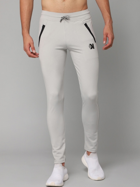 

JACKDANZA Men Cream Brand Logo Printed Track Pants