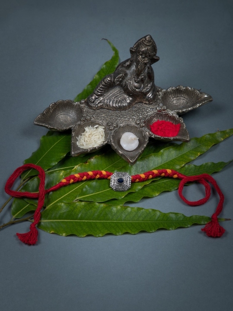 

creyons by mansi Red & Orange Silver Toned Rakhi