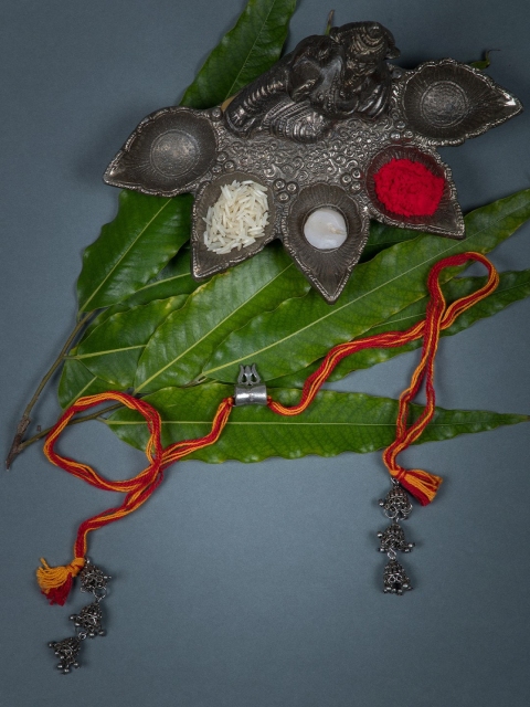 

Creyons by Mansi Women Orange & Yellow Silver Toned Rakhi