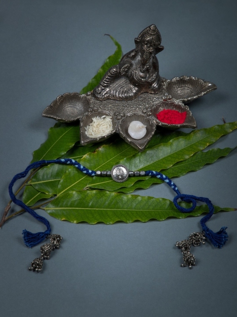 

creyons by mansi Women Blue & Silver-Toned Beaded Lumba Rakhi