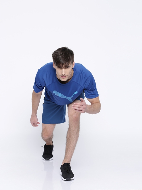 

Puma Men Blue Solid Regular Fit Sports Shorts